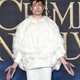 Illustration for article titled Now Ezra Miller is just walking around with The Killing Curse written on his hands, which seems dangerous